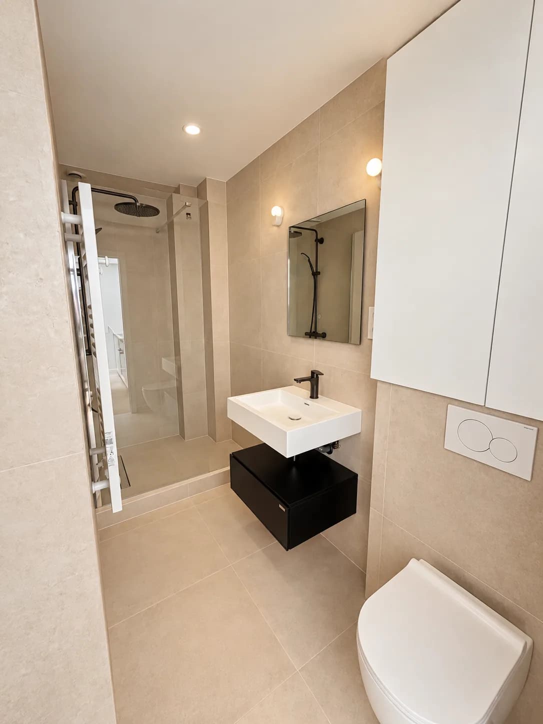 Shower room with walk-in shower, washbasin and wall-hung WC