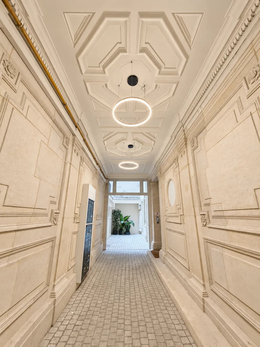 Period building entrance, mouldings and access to the cobbled courtyard